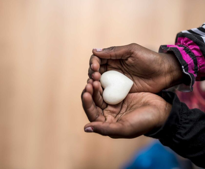 closeup-of-african-american-girl-holding-a-marble-2023-11-27-05-33-54-utc