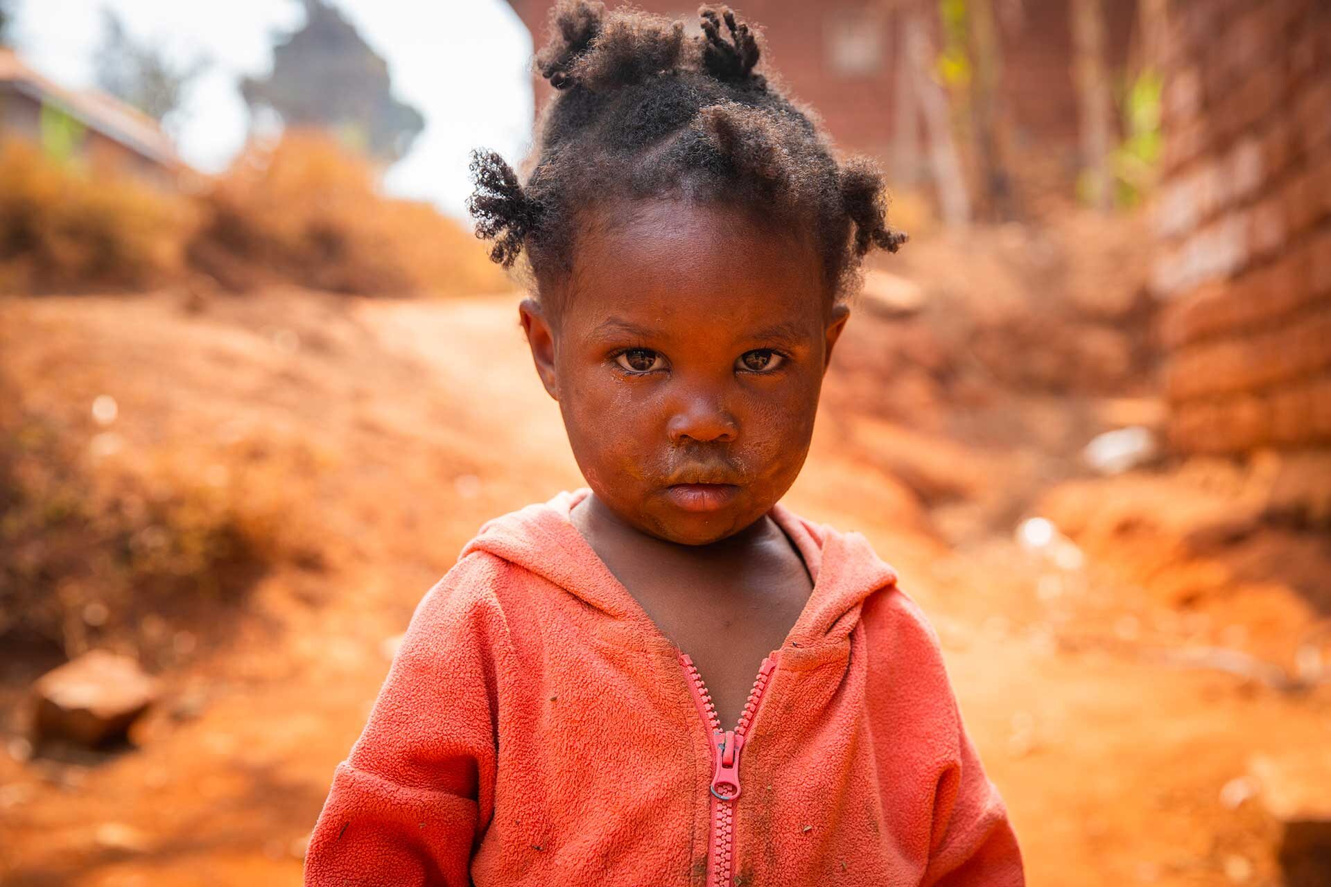 poor-little-girl-wearing-dirty-clothes-in-an-afric-2023-11-27-05-25-58-utc